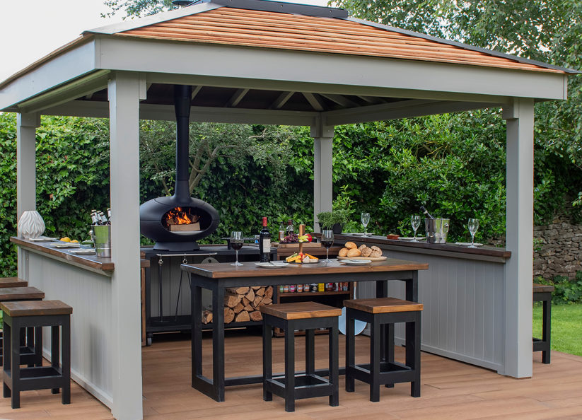 Luxury outdoor living structure with evening lighting